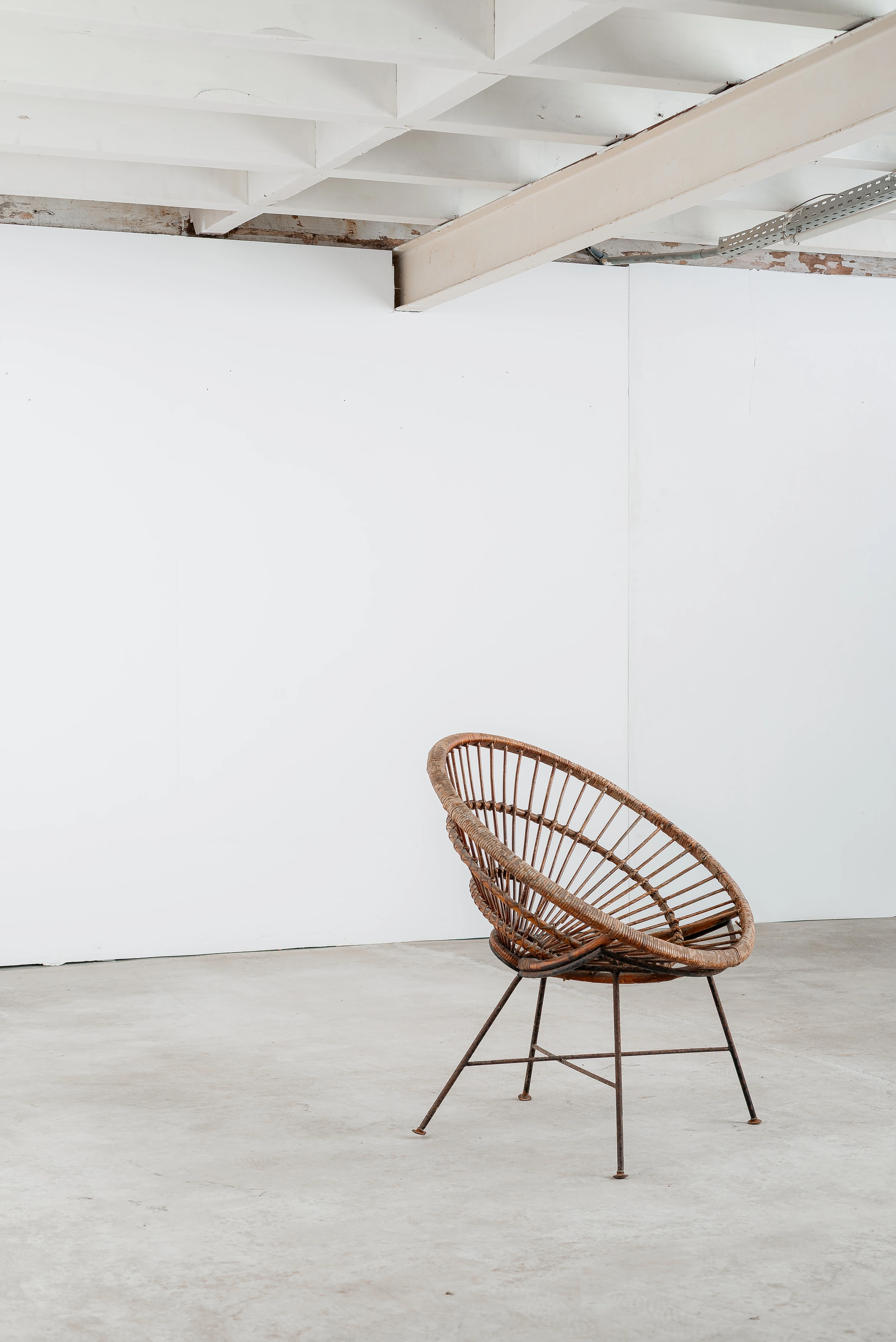 Wicker round armchair — Carlo Hauner & Martin Eisler