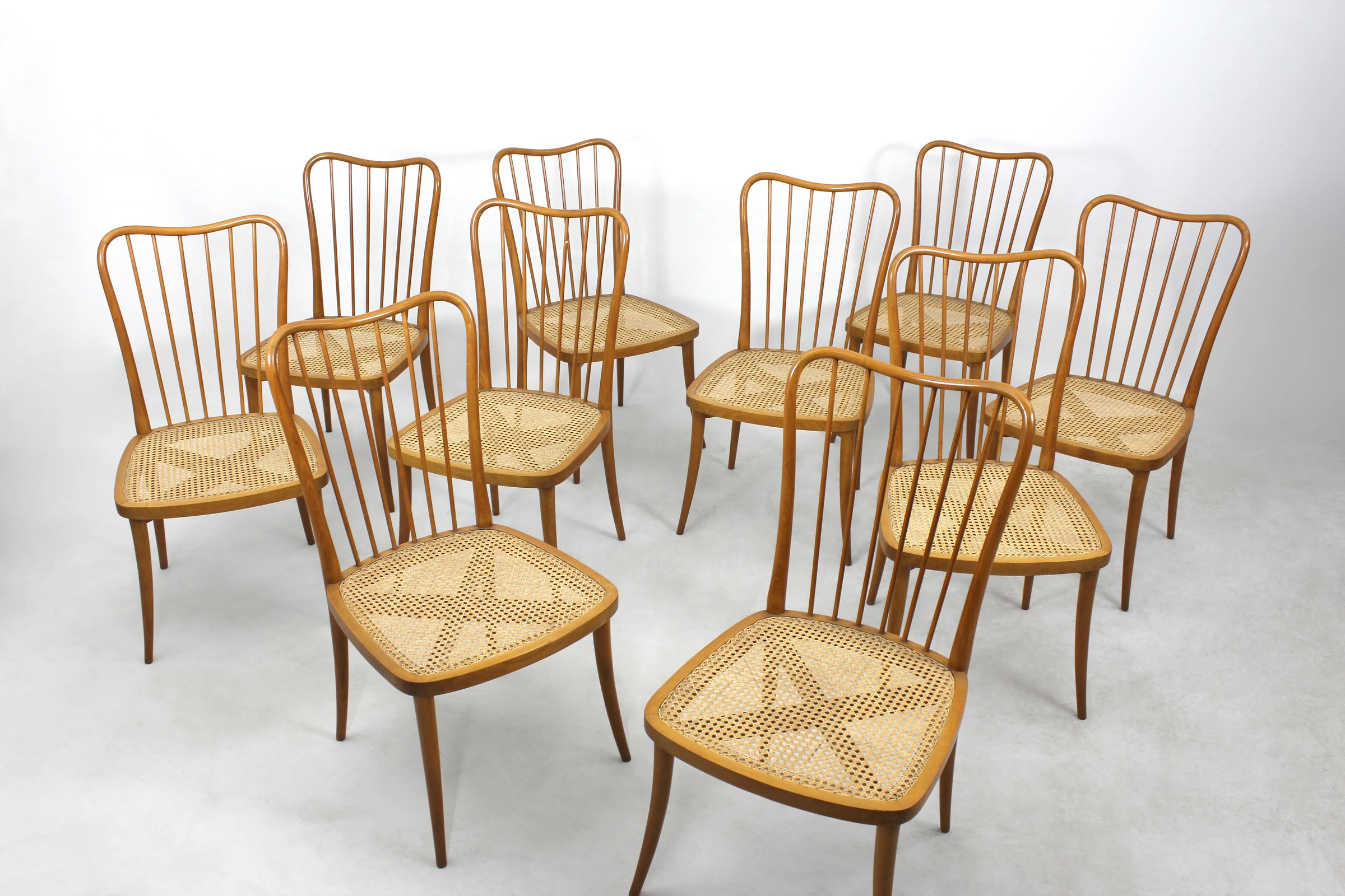 Dining table with a suite of ten chairs, Joaquim Tenreiro — photo 4