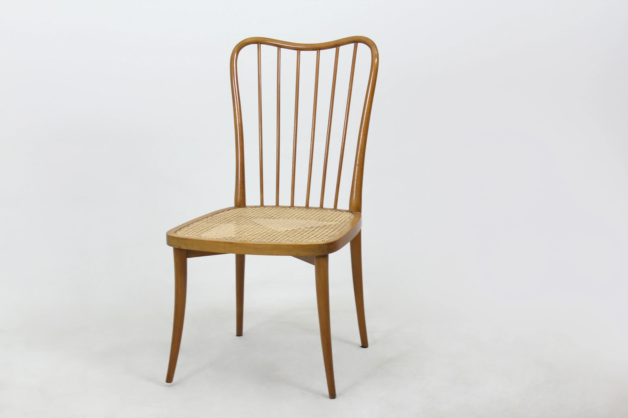 Dining table with a suite of ten chairs, Joaquim Tenreiro — photo 5